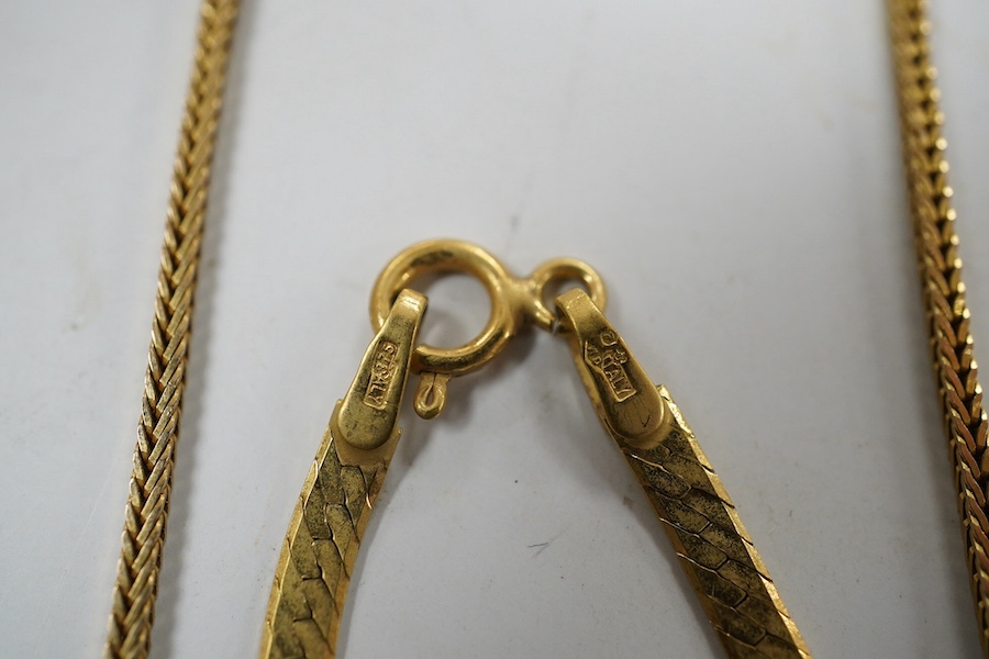 Four assorted 9ct gold chains or necklaces and a 9ct gold bar brooch, 14.7 grams. Condition - fair to good